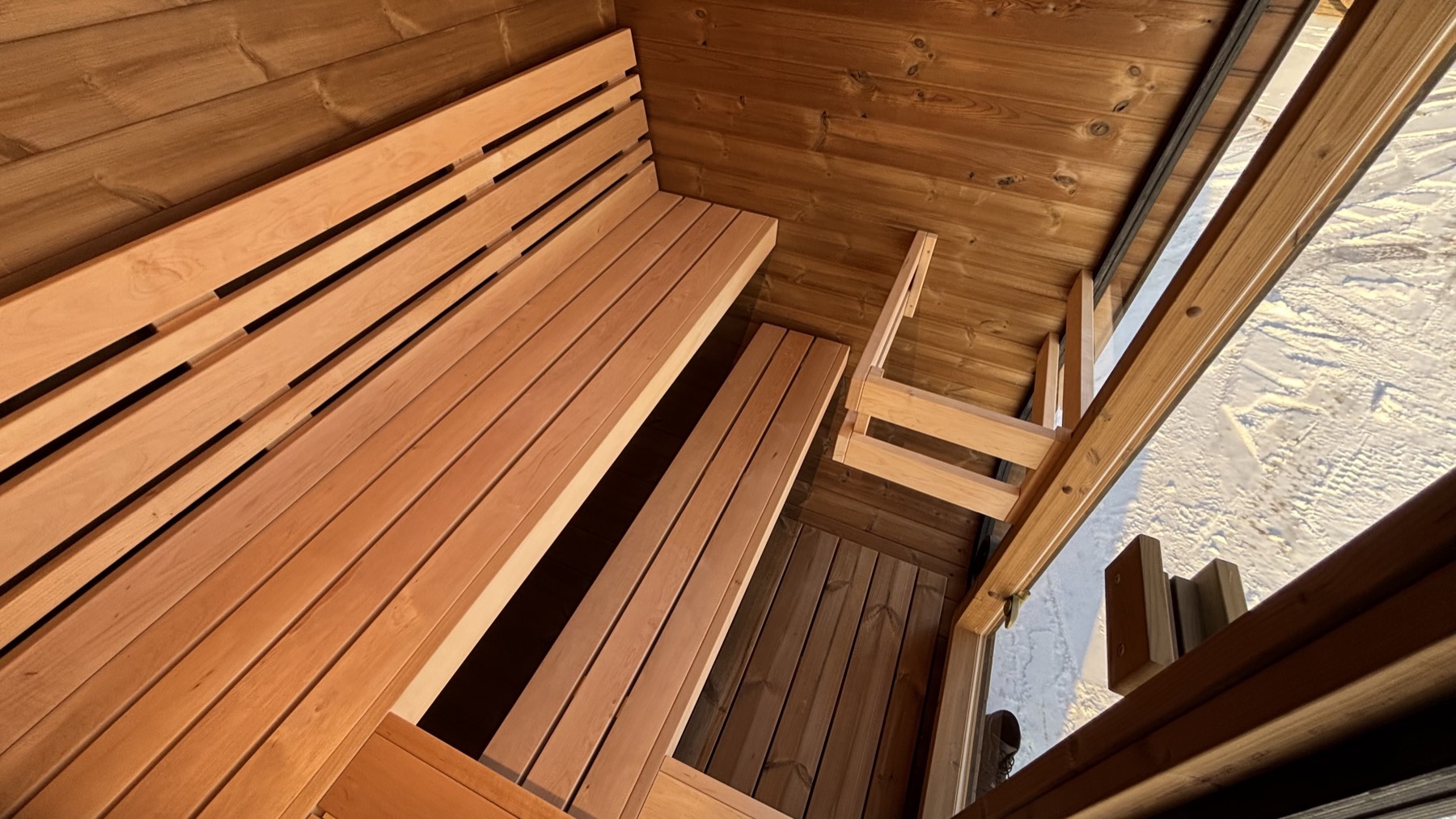 Lahti Mini interior with two-tier alder benches